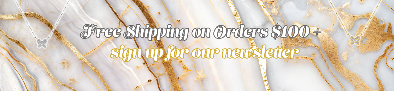 Promotional banner with marble background and gold accents reading ‘Free shipping on orders $100+’ and ‘Sign up for our newsletter’